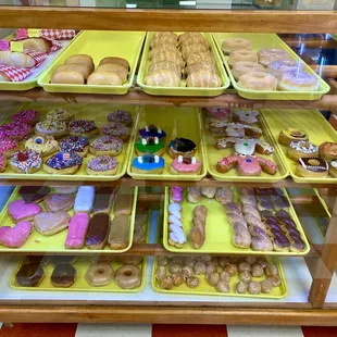 a display of various types of doughnuts