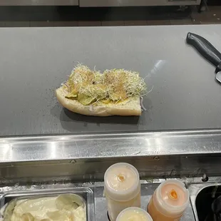 a sub sandwich and condiments