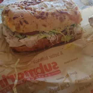 1/2 of an extra large. In other words, the subs are huge!!