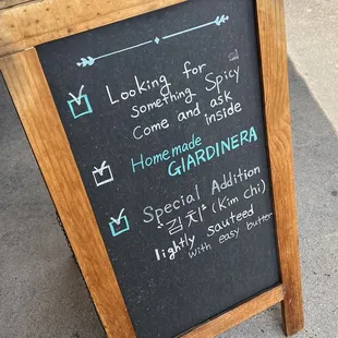 a chalk board with a list of items on it