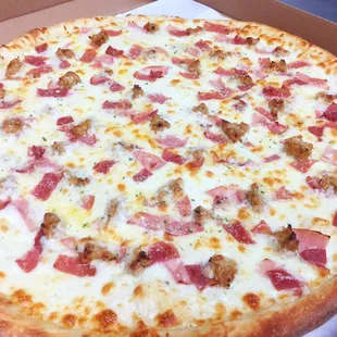 The Italian.. Olive oil and garlic base with mozzarella, ham, salami, capicola, sausage and Parmesan!!!