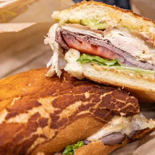The Say Hey Kid: Toasted Dutch Crunch, Chicken Breast, Roast Beef, Swiss, Pepper Jack, Bacom, Avocado, Lettuce Tomato &amp; Sauce ($12)