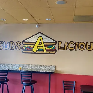 a sign for subs a licious