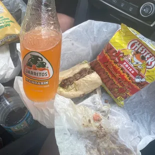 Half of my 6in sub with a jarritos drink and hot fries!