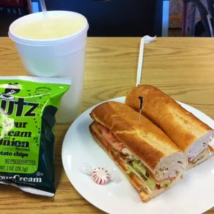 Chicken Philly w/ chips and a drink.