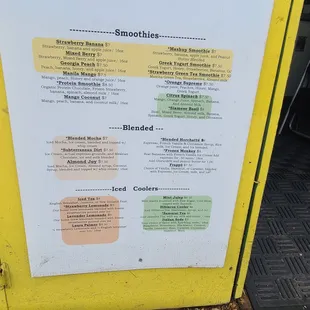 a menu on a yellow box