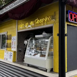 a yellow and white coffee shop