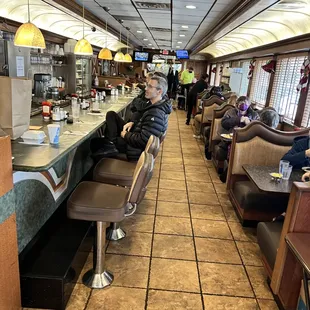 a man sitting at the bar