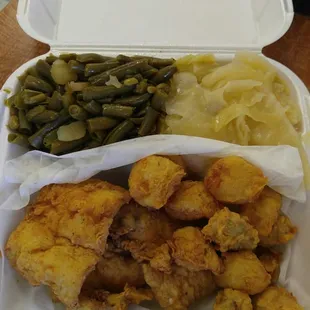 a container of fried chicken and green beans