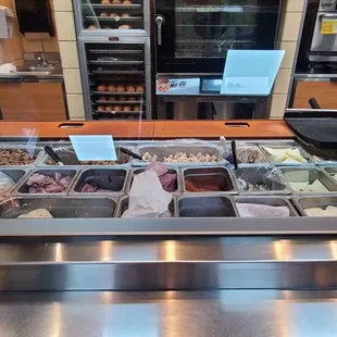 a view of a counter with a variety of food items