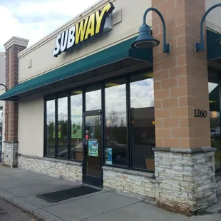 the entrance to a subway restaurant