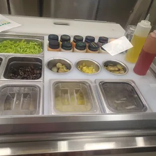 Condiments &amp; veggies stocked