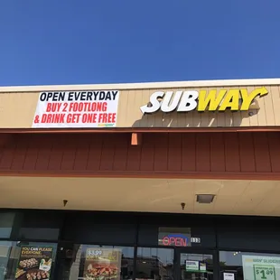 the entrance of a subway restaurant