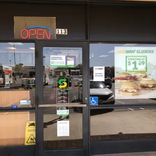 the front door of a subway restaurant