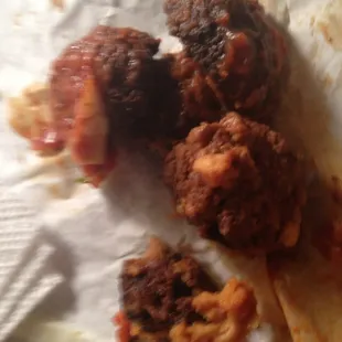 Burned meatball. I saw another review complained about their toaster. It looks like Subway doesnt care about customer review