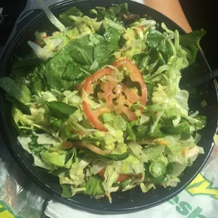 a salad in a bowl on a table