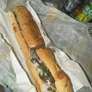 a sub sandwich in a wrapper