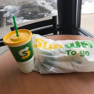Meatball marinara with chips and med drink.