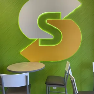 a table and chairs in a subway subway subway subway subway subway subway subway subway subway subway subway subway subway subway subway