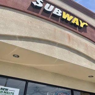 the entrance of a subway restaurant