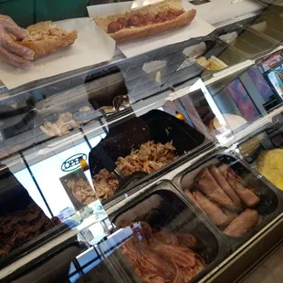 a display case filled with different types of food