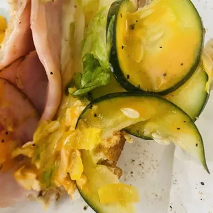 Ham Sub sandwich with slather of some sort of lotion or sunblock or ointment which tastes extremely bitter.