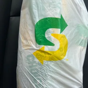 a plastic bag in the back of a car