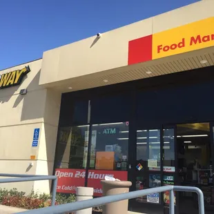 the entrance to a subway restaurant
