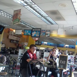 a man and a woman sitting at a table