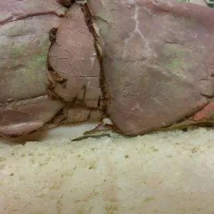 here&apos;s a photo of my subway sandwich today. meat has a nice hue of green/orange.