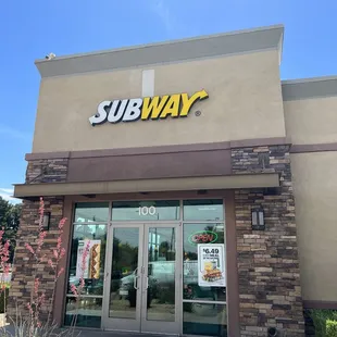 the entrance of a subway restaurant