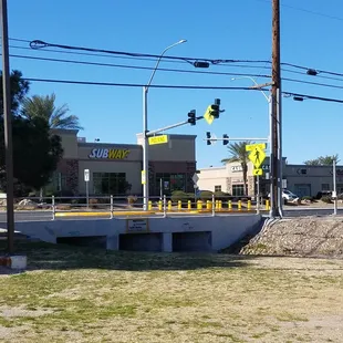 There is a new crosswalk with a flashing beacon to Sunset Regional Park that alerts traffic to stop.