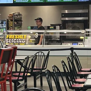 this guy was extremely rude and I was standing In line he pretended to put the gloves on to serve me and then laughed and walked away