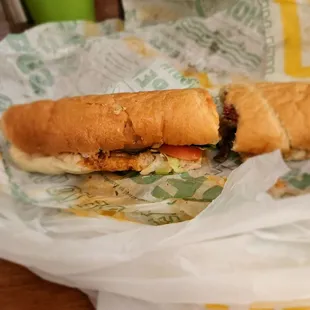 a sub sandwich sitting on a table