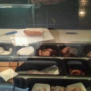 a display case of pastries and pastries