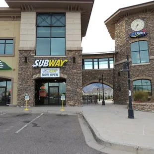 the entrance to a subway restaurant