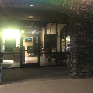 the entrance to a subway subway station