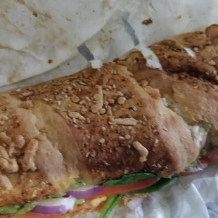 a closeup of a sandwich on a wrapper