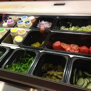 a variety of salads and condiments