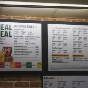 a menu for a meal deal on a brick wall