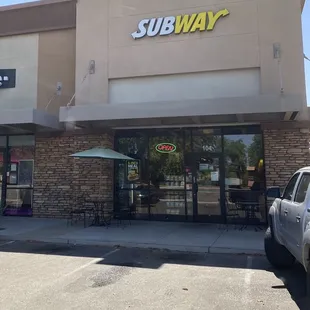the entrance of a subway restaurant