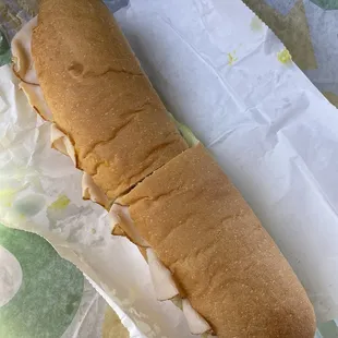 a sub sandwich on a wrapper