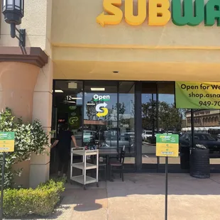 the entrance of a subway restaurant