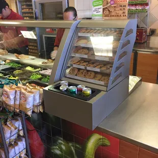 a counter with a variety of food items