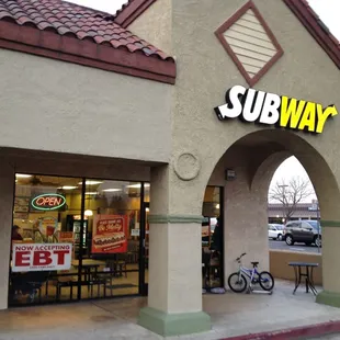 the entrance to a subway restaurant