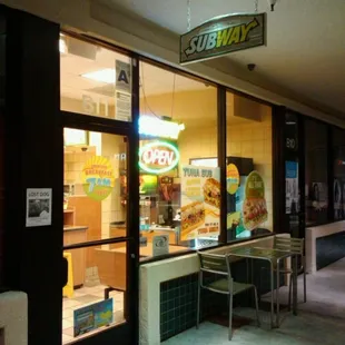 the entrance of a subway restaurant