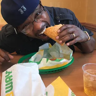 Hubby with tomato wrap