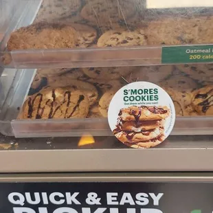 a display case of cookies and pies