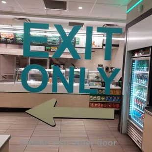 exit only sign in a subway station