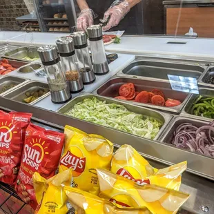 a person preparing food in a subway